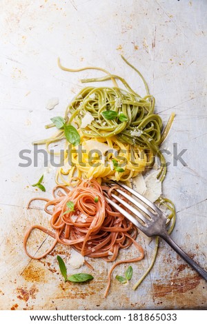 Italian pasta Italian flag colors with basil and parmesan