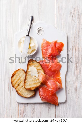 Salted smoked red fish and grilled slices of bread for breakfast