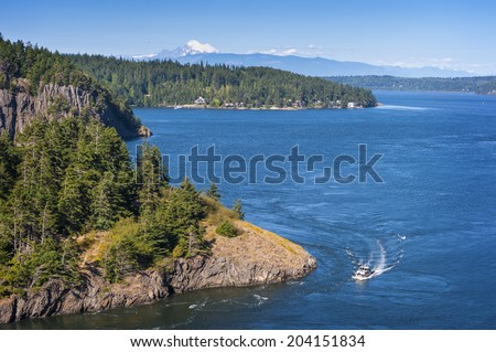 Deception Pass State Park, Washington .Rugged cliffs drop to meet the turbulent waters of Deception Pass. The park is known for its breath-taking views, old-growth forests, and abundant wildlife.
