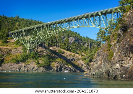 Deception Pass State Park, Washington. The Deception Pass Bridge is a two-lane bridge on Washington State Route 20 connecting Whidbey Island to Fidalgo Island in the U.S. state of Washington.