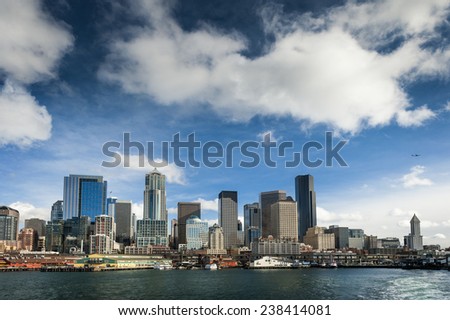 Seattle Skyline from a Ferryboat. Seattle Skyline after leaving the Coleman Ferry dock during a lovely sunny day in the Pacific Northwest.