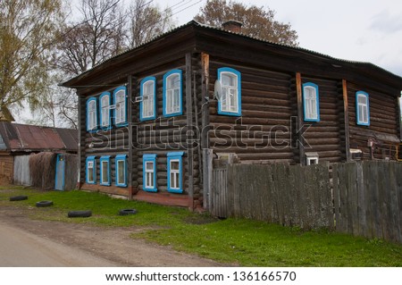Old wooden house in the Russian tradition in the village
