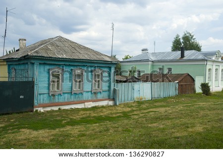 Ancient wooden house made in the Russian tradition in a country town