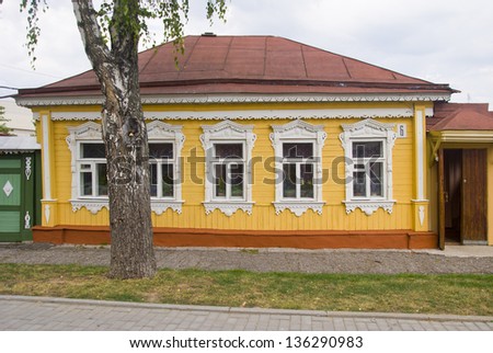 Ancient wooden house made in the Russian tradition in a country town