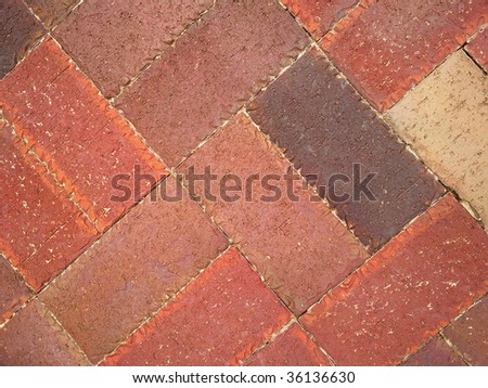 Diagonal herringbone brick pattern.