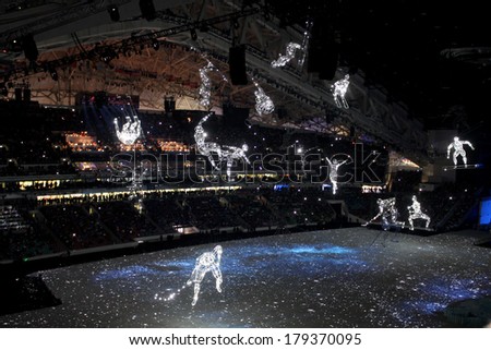 SOCHI, RUSSIA - FEBRUARY 7, 2014: installation of two elements - the universe and athletes - occurs at the opening ceremony of the XXII Olympic Winter Games on February 7, 2014 in Sochi.
