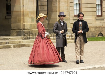 CHARLOTTETOWN, PRINCE EDWARD ISLAND/CANADA - JULY 07, 2014: The Confederation Players dressed as Fathers and Ladies of Confederation in Charlottetown in Prince Edward Island in Canada.