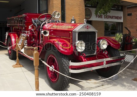 CHARLOTTETOWN, PRINCE EDWARD ISLAND/CANADA - JULY 7, 2014: Antique fire truck at Charlottetown Fire Department in Prince Edward Island.