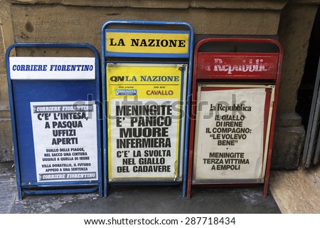 FLORENCE, TUSCANY/ITALY - MARCH 31, 2015: Newspapers on the streets of Florence in Italy.