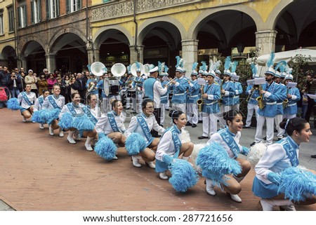 PISA, TUSCANY/ITALY - MARCH 29, 2015: Dancers and orchestra on streets of Pisa in Italy.