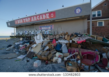 SEASIDE HEIGHTS, NJ/USA - JANUARY 18: Debris caused by hurricane Sandy damage is piled outside a boardwalk arcade on January 18, 2013 in Seaside Heights, New Jersey.
