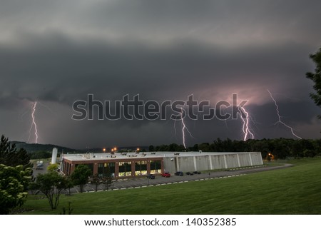 A severe thunderstorm approaches a Hudson valley factory