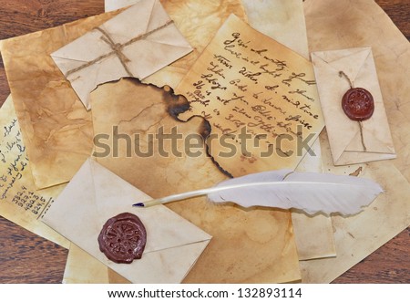 Letter background with feather and envelopes