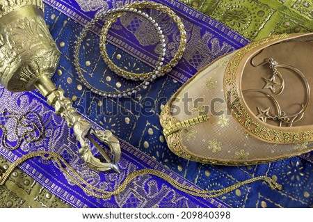 Indian still life with belly dance shoe and jewelry