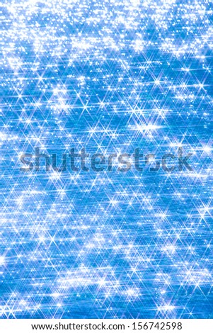Backgrounds of sparkling blue water surface