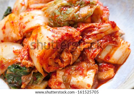 A bowl of stuffed pasta and red sauce.