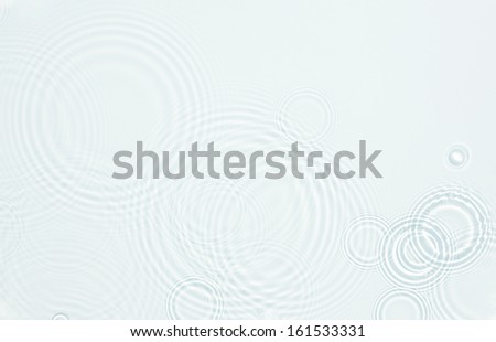 A pale background with various sized circles.