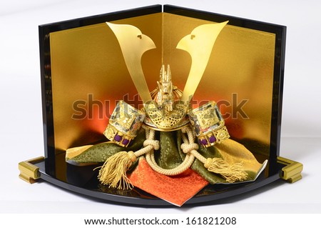 A gold and black statue decoration.