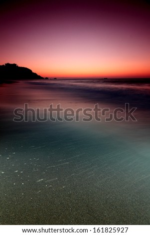 Sandy beach at evening glow
