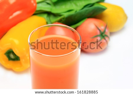 Fresh vegetable juice on white background