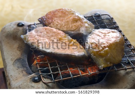 Salted fish on grill