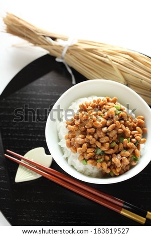A round bowl filled with rice and beans.