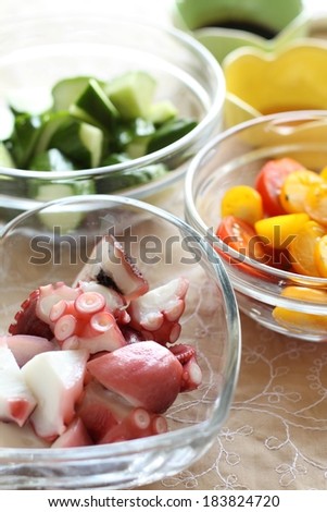 Three different glass bowls with different types of food in them.