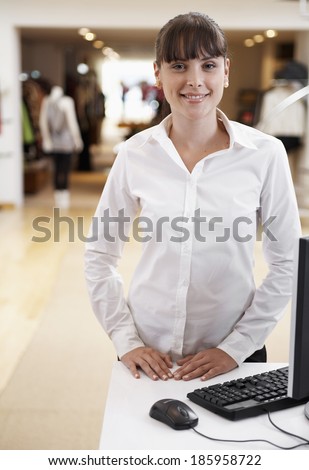 Sales clerk in clothing store