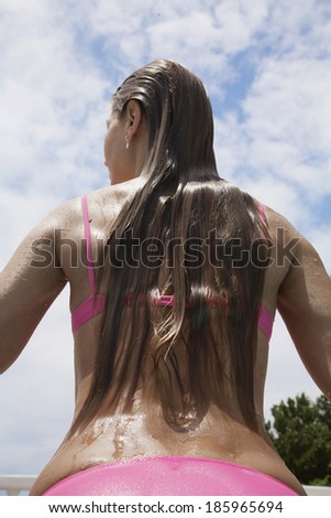 Female swimmer in bikinis (rear view)
