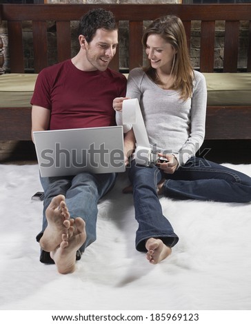 Couple With Dirty Feet Managing Finance