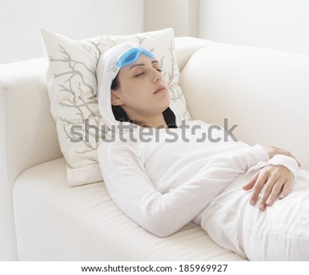 Mid-Adult Woman Sleeping on Couch