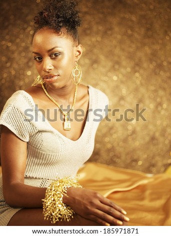 Young Woman Wearing Gold Jewelry