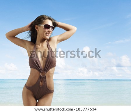 Young Woman Posing in Swimming Costume