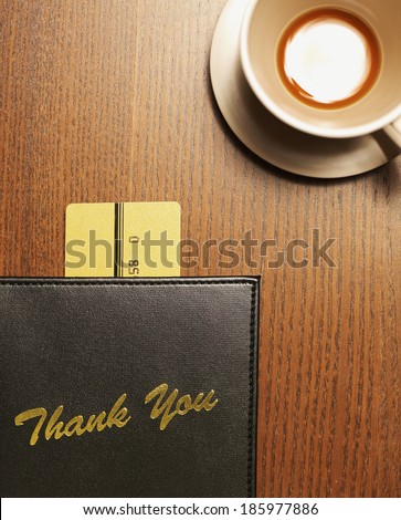 Credit Card Payment Beside Coffee Cup