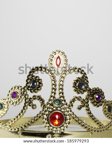 Close-Up of Fake Jewel-Encrusted Plastic Golden Tiara