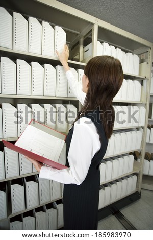 file cabinet and business woman