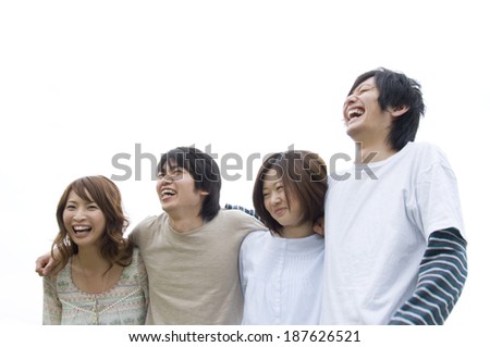young people with their arms around each other