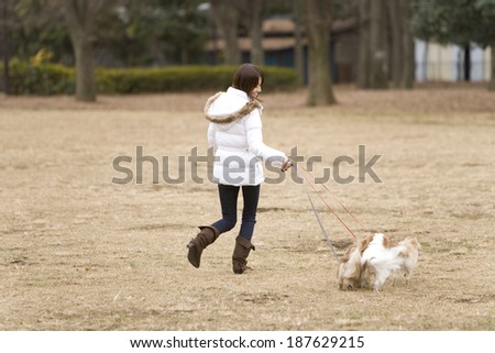 dog and woman running