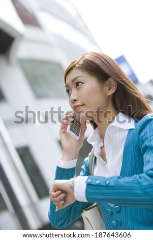 woman talking on the phone on street