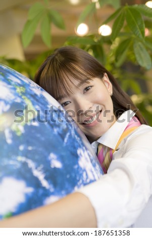 woman hugging earth