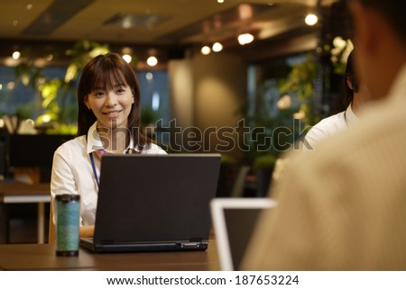 young business woman using PC