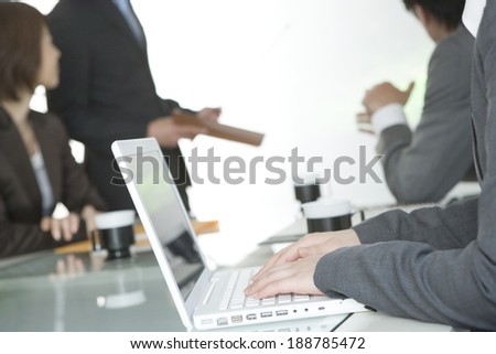 businessman and business woman in meeting