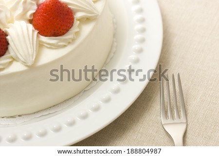 Strawberry fancy cake and fork