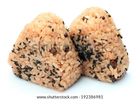 Two triangular shapes that are made of packed rice.