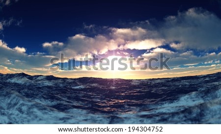 A choppy sea seen under a cloudy sky with a bright sunshine.