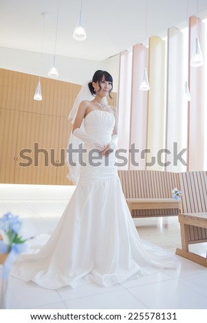 Bride in the wedding dress in the church
