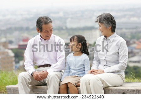 Elderly couple and their grandson