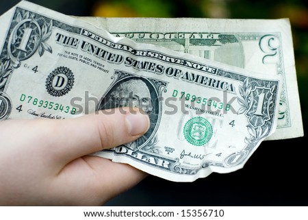 http://image.shutterstock.com/display_pic_with_logo/136720/136720,1217049564,1/stock-photo-six-dollars-in-united-states-currency-held-in-the-right-hand-15356710.jpg