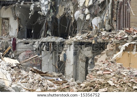 A still-life of the infrastructure of a concrete structure that\'s being torn down.