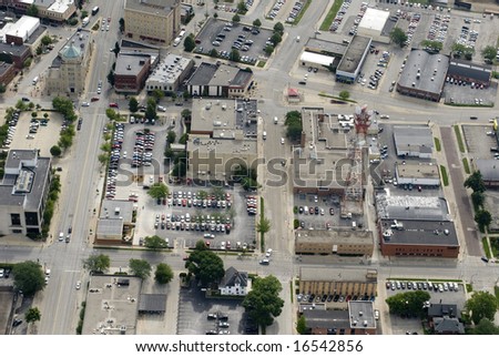 A broad view of a city\'s commercial district.